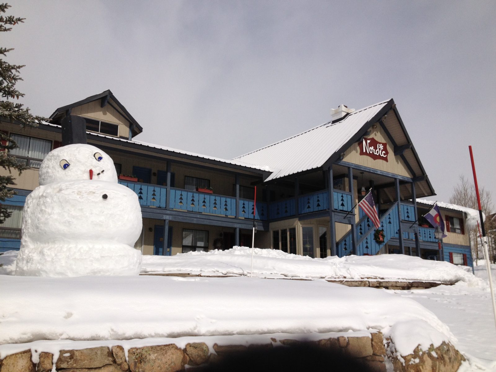 snowman in front of hotel