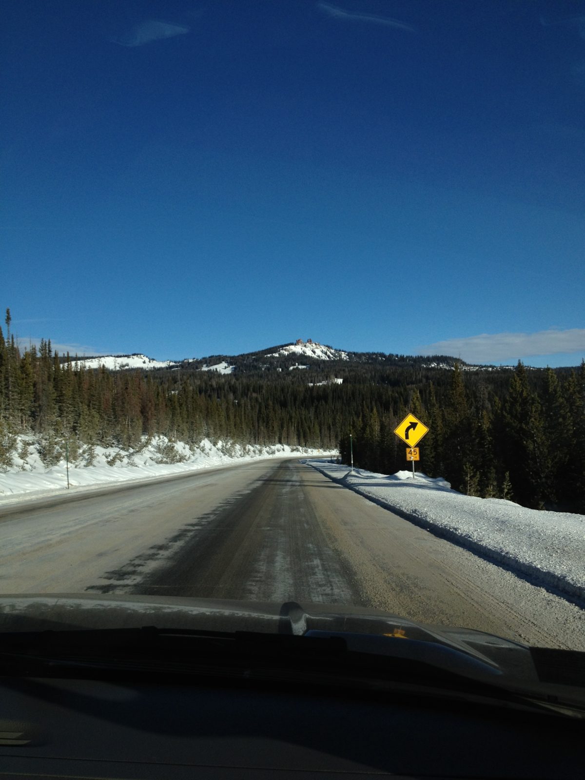 road with mountain in bacground