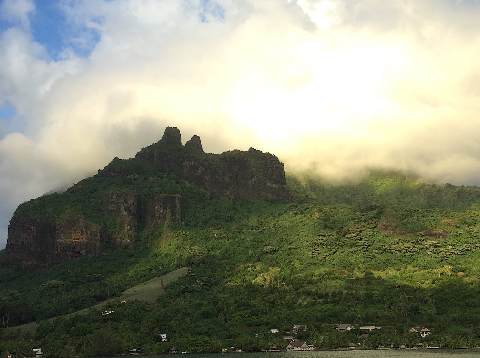 green island with clouds