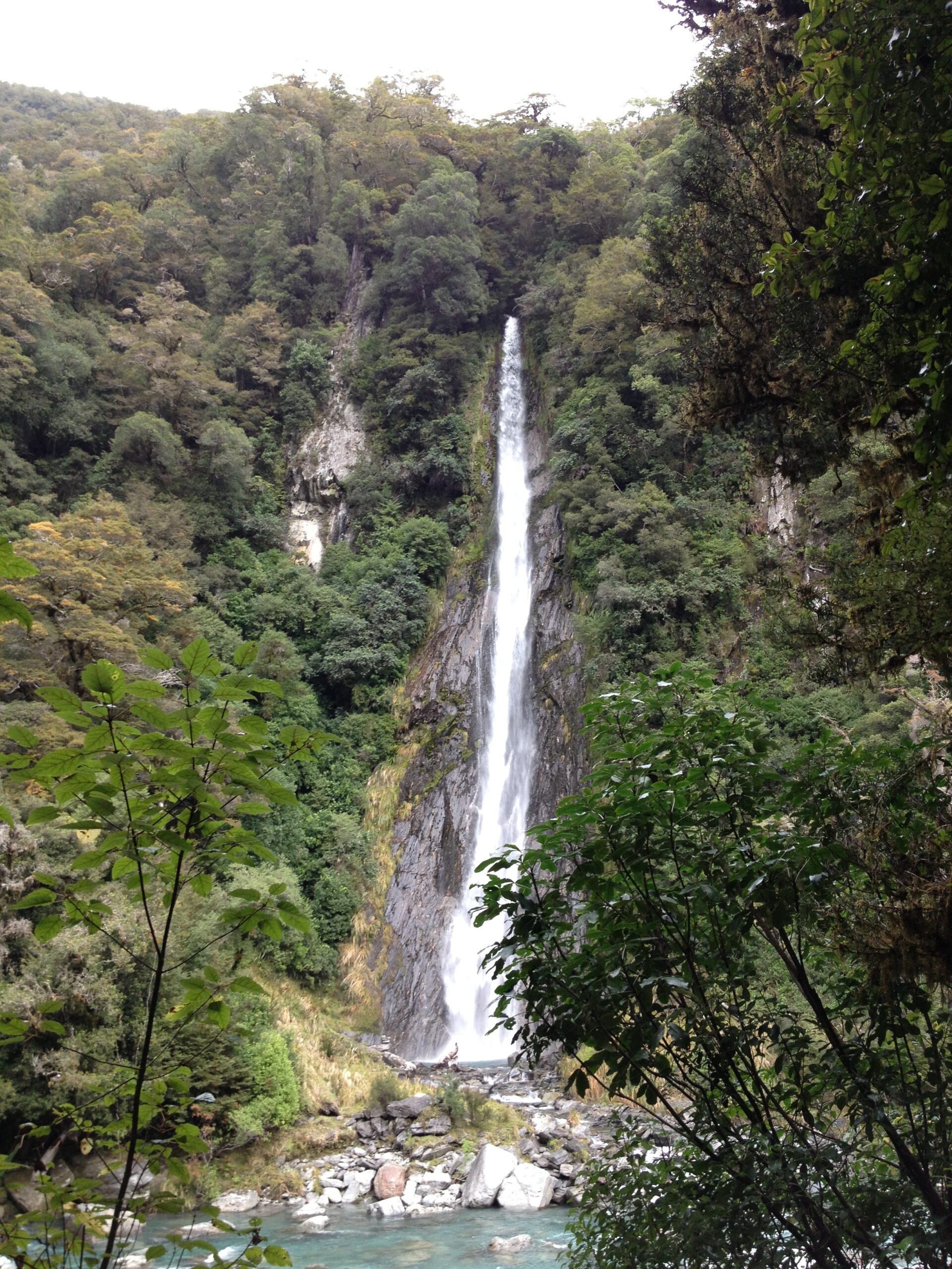 Tall narrow waterfall in Tahiti