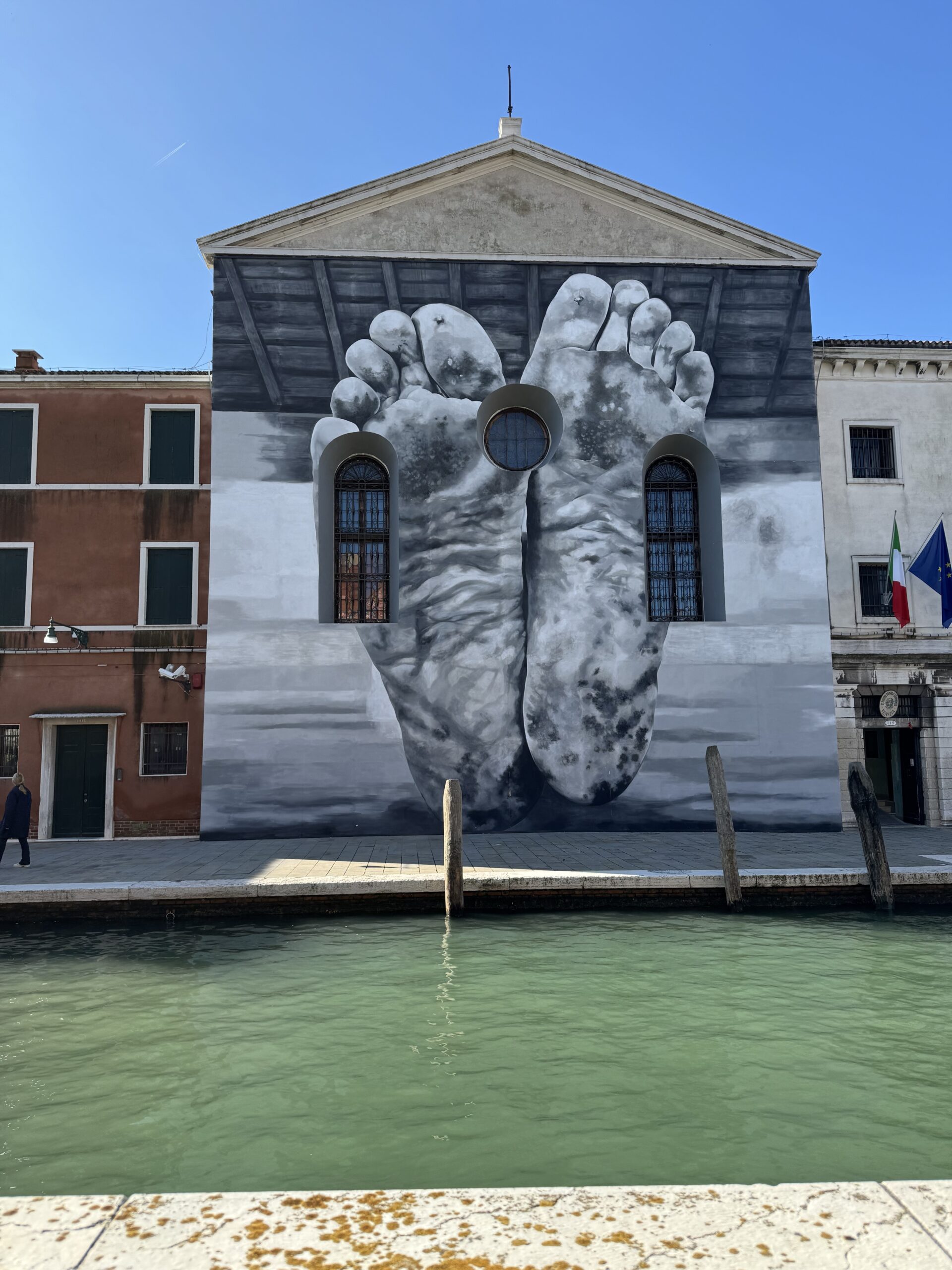 Large mural of feet art installation Venice